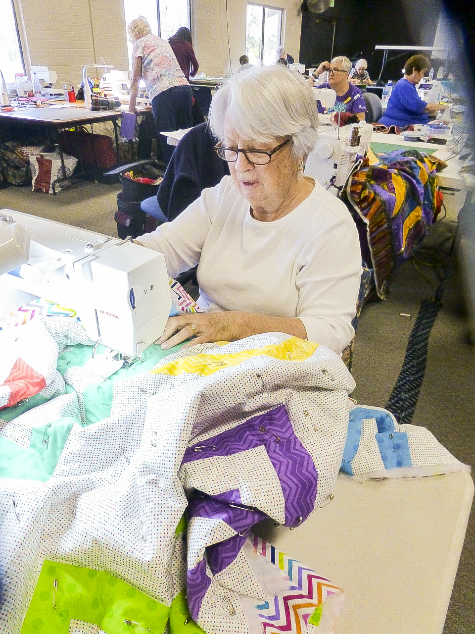 women quilting