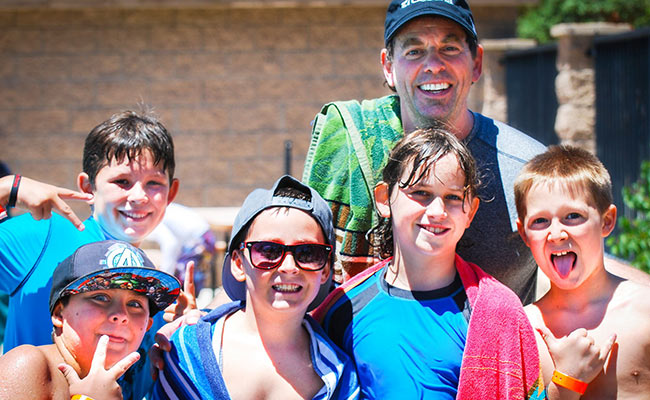 Boys youth group swimming at the pool at Angeles Crest Christian Camp